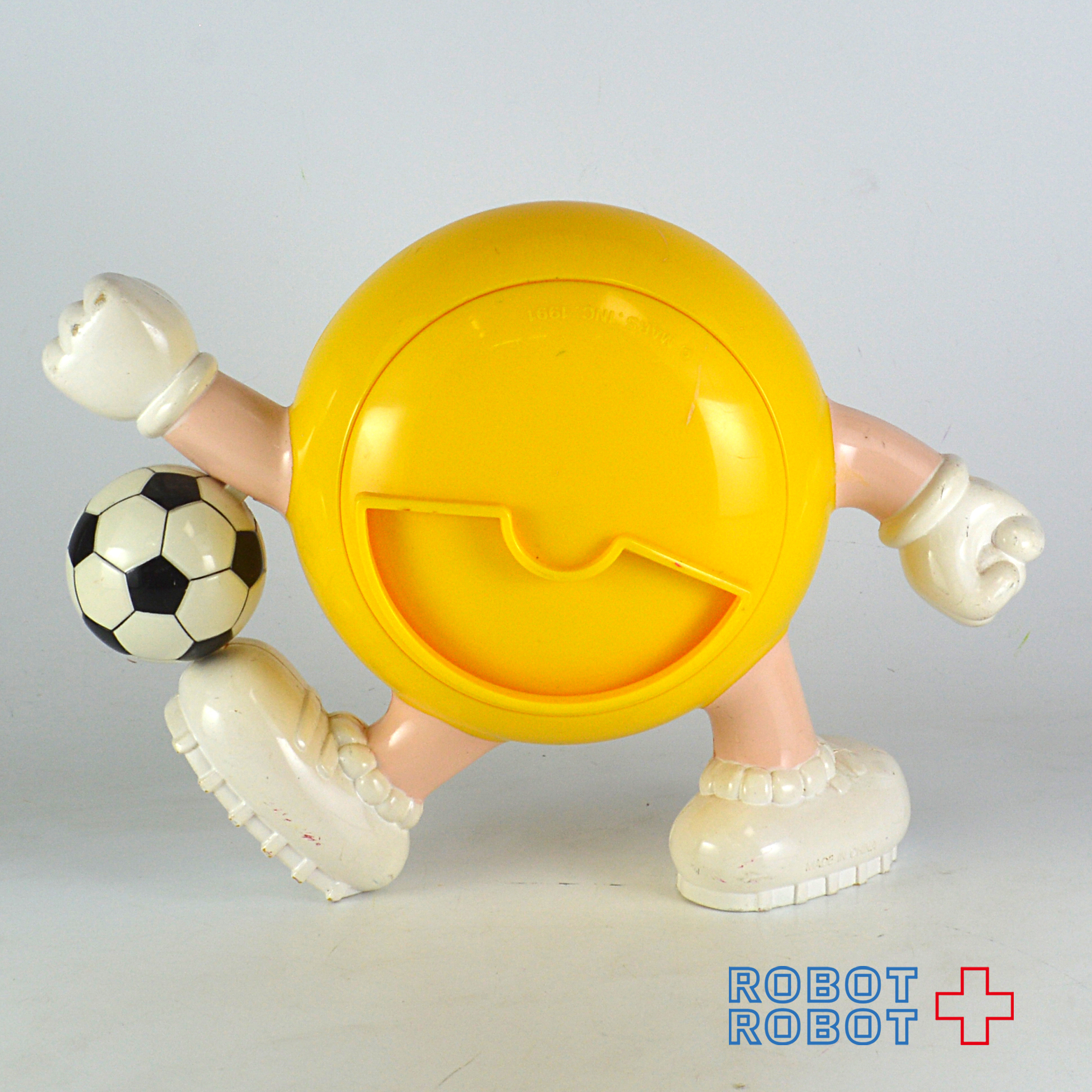 M&M's ディスペンサー イエロー サッカー エムアンドエムズ 1991 企業物 入荷写真